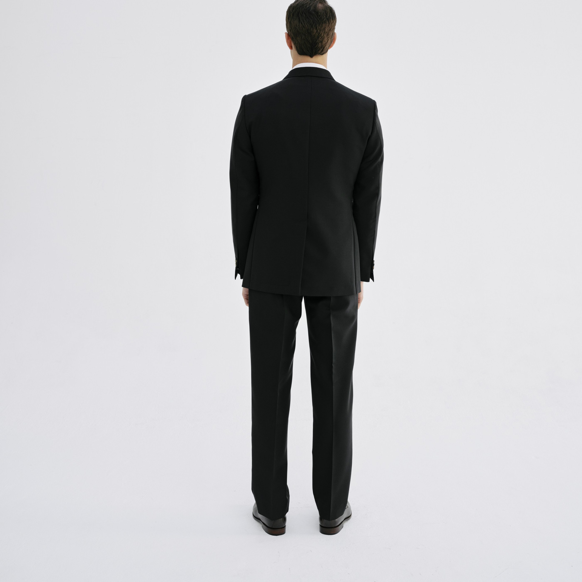 Costume croisé noir boutons en cornes